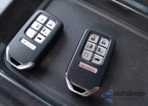 2022 Honda Odyssey Touring from USA, damaged, VIN 5FNRL6H84NB027030